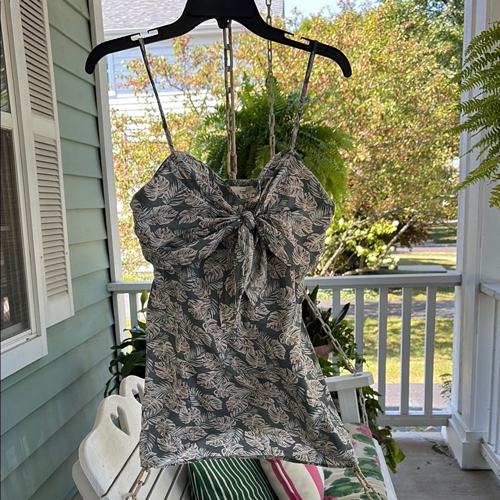 Leaf Print Spaghetti Strap Top with adjustable straps and elastic back.